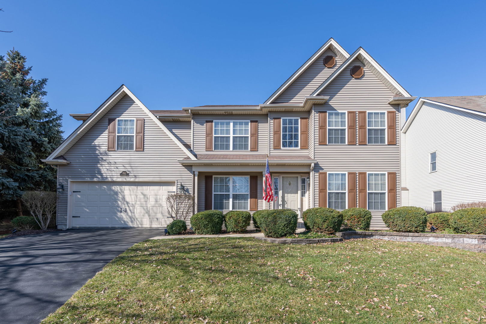 3040 Wagner Road Aurora, IL 60502 - Photo 1 of 37 a front view of a house with a yard