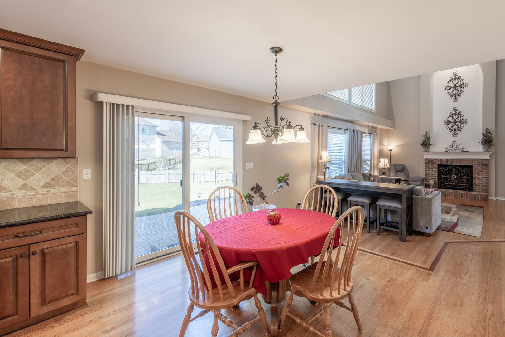 3040 Wagner Road Aurora, IL 60502 - Photo 12 of 37 a view of a dining room with furniture window and wooden floor