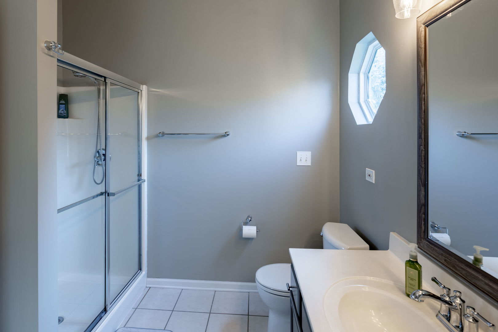 3040 Wagner Road Aurora, IL 60502 - Photo 25 of 37 a bathroom with a sink a toilet and shower