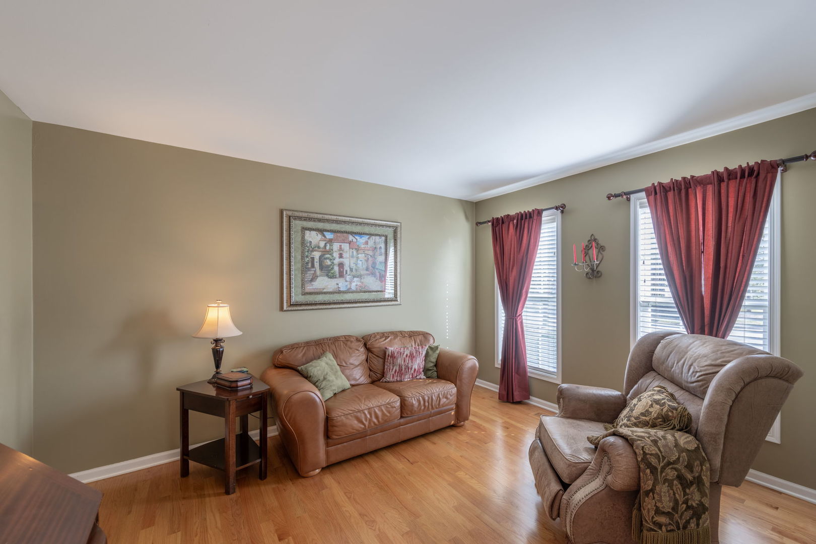 3040 Wagner Road Aurora, IL 60502 - Photo 4 of 37 a living room with furniture a couch and a window