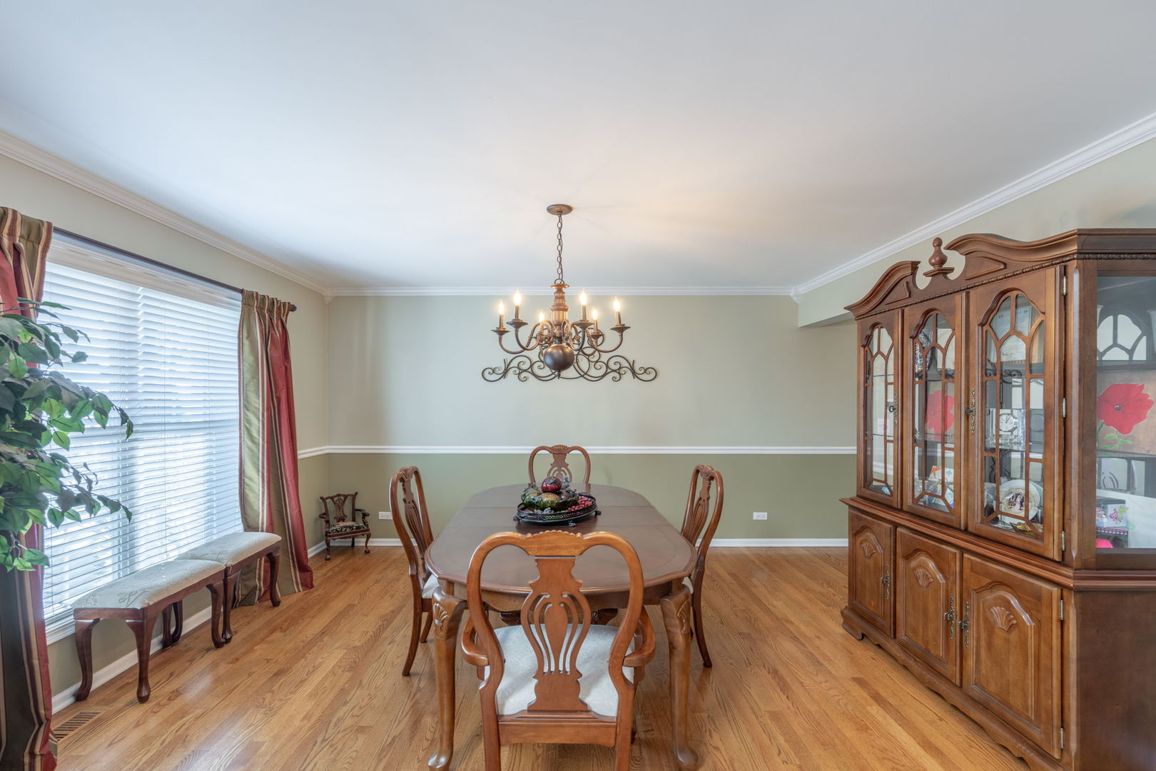 3040 Wagner Road Aurora, IL 60502 - Photo 5 of 37 a view of a dining room with furniture window and wooden floor