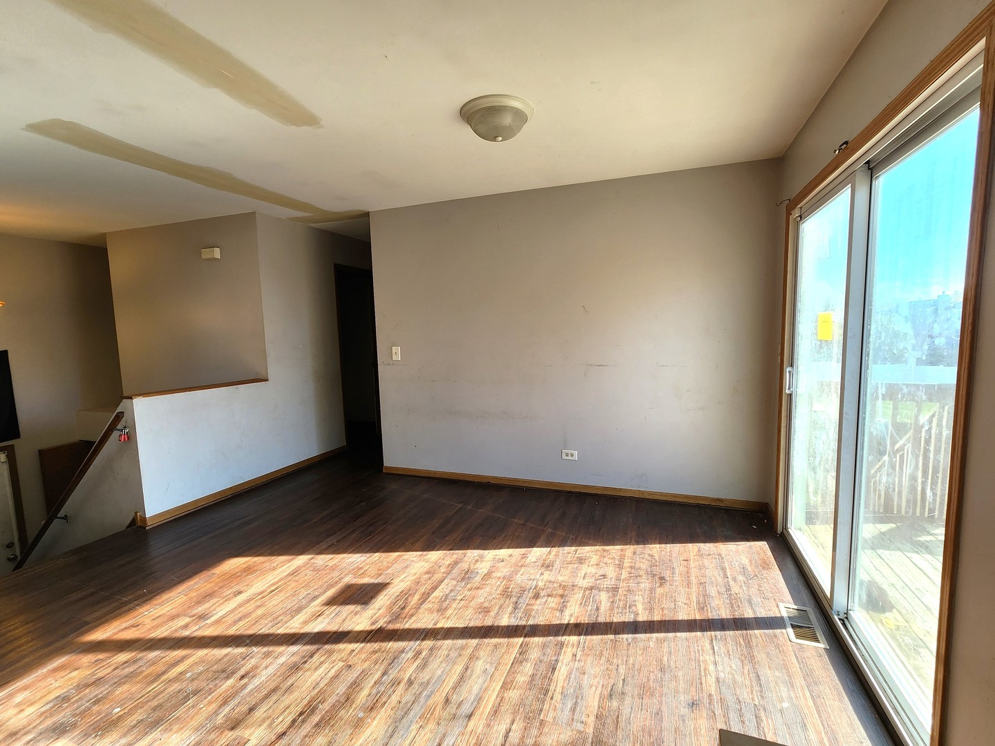 5216 Riviera Boulevard Plainfield, IL 60586 - Photo 6 of 14 a view of an empty room and window