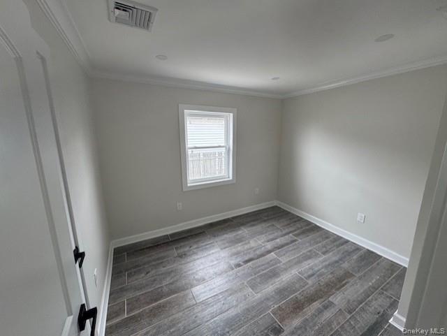 11 Bayview Avenue Lawrence, NY 11559 - Photo 13 of 18 an empty room with wooden floor and window