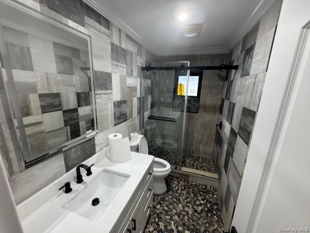 11 Bayview Avenue Lawrence, NY 11559 - Photo 16 of 18 a bathroom with a sink toilet and shower
