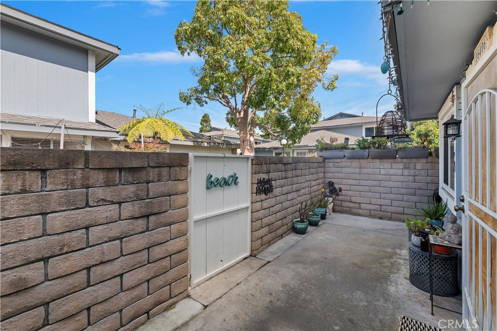 16406 Vista Roma Circle, Unit 115 Huntington Beach, CA 92649 - Photo 17 of 26 a view of a outdoor space with seating area