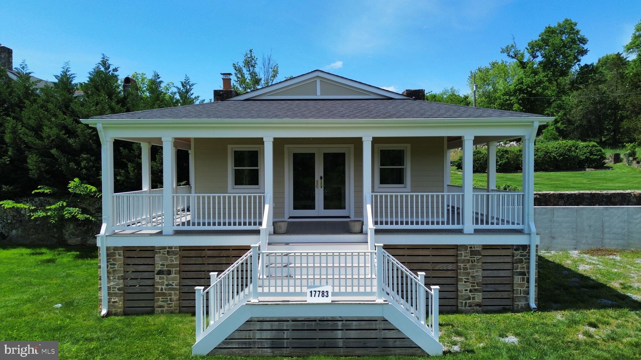 17781 Roxbury Hall Road Leesburg, VA 20175 - Photo 8 of 107 a front view of a house with a porch