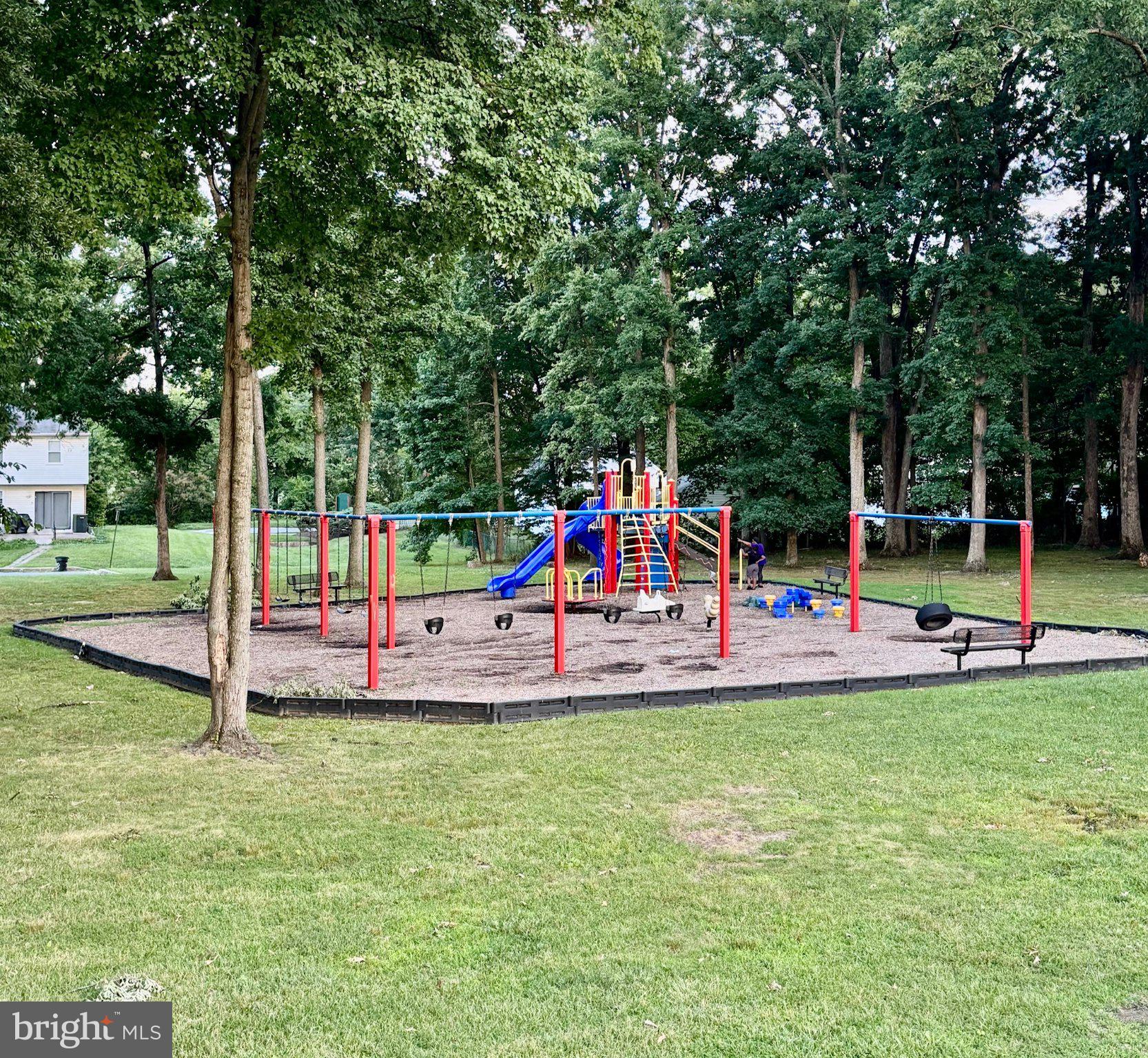 813 Thimbleberry Road, Unit 813 Baltimore, MD 21220 - Photo 31 of 32 Vibrant playground nestled in nature.