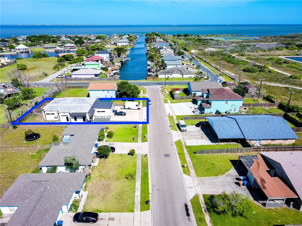 306 Easy Street, Unit A Corpus Christi, TX 78418 - Photo 20 of 22 a view of swimming pool with outdoor seating and yard