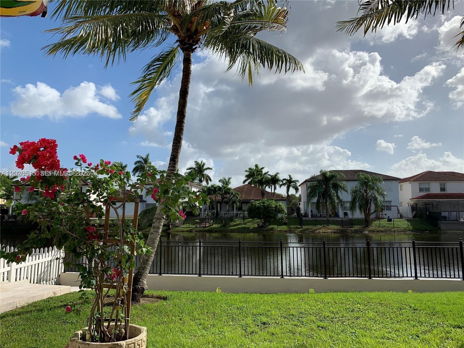 1065 Southwest 150th Place Miami, FL 33194 - Photo 10 of 14 a view of a lake