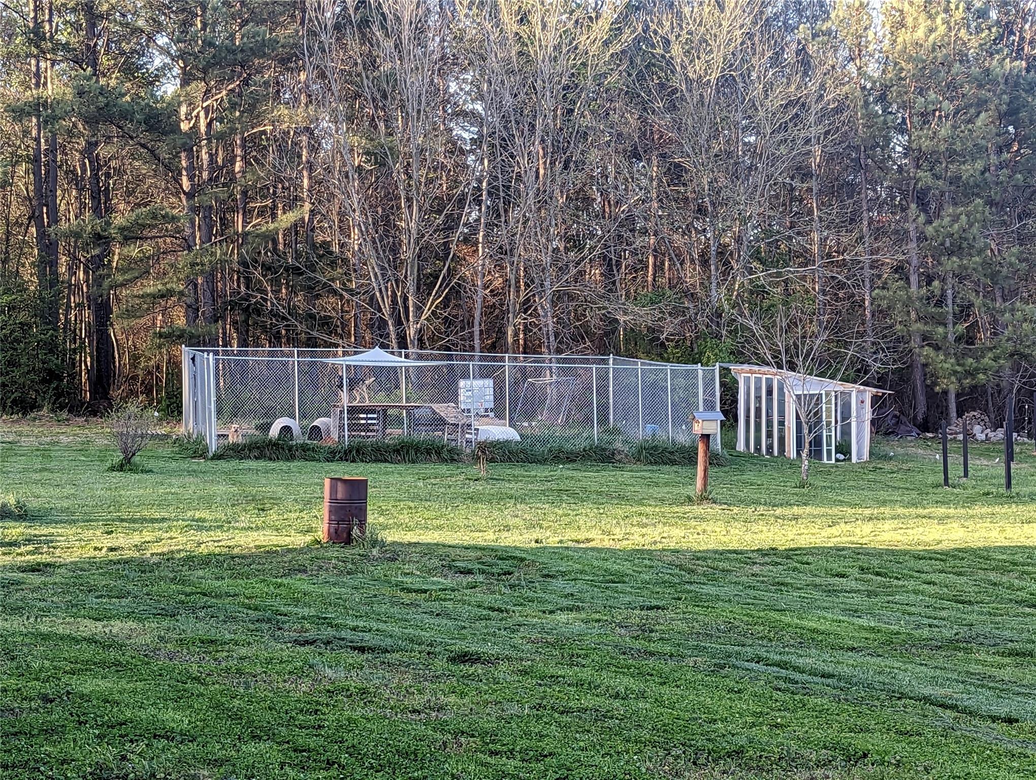 21824 Joy Road Locust, NC 28097 - Photo 19 of 24 a view of a back yard