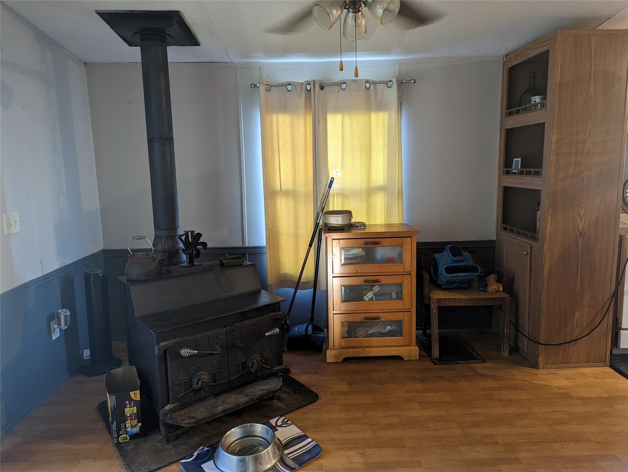 21824 Joy Road Locust, NC 28097 - Photo 8 of 24 a view of a workspace with furniture and a window