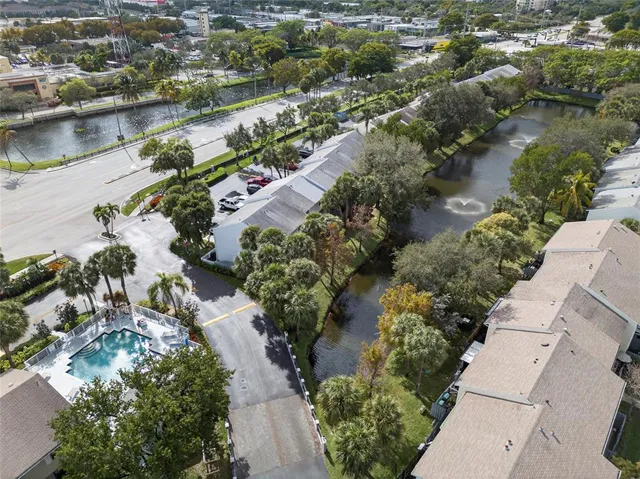 an aerial view of a city with lake view