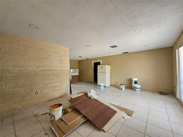 a bedroom with a bed and a walk in closet