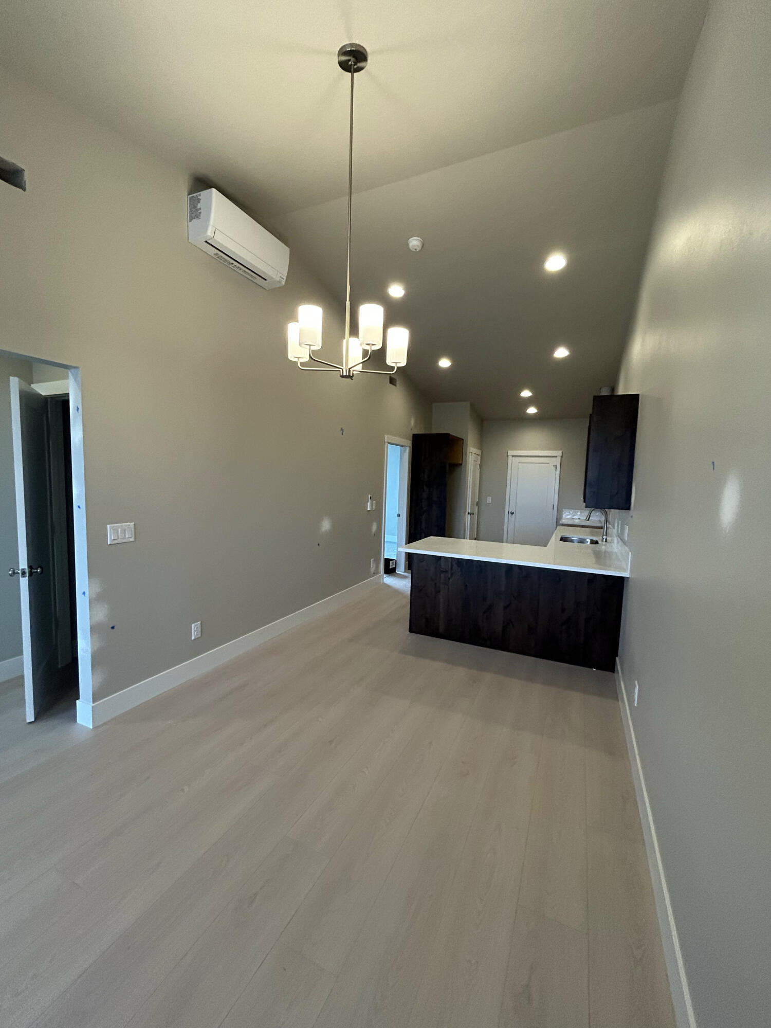 3910 Southwest 39th Street, Unit LOT 40 Redmond, OR 97756 - Photo 12 of 26 Great room to kitchen