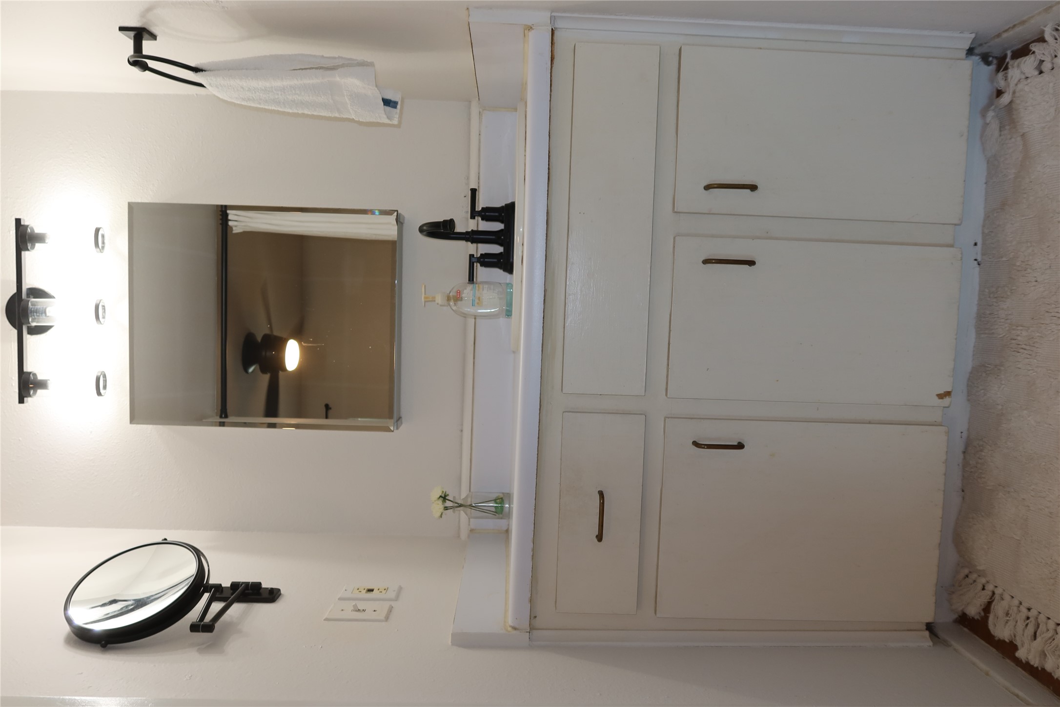 3400 Speedway, Unit 104 Austin, TX 78705 - Photo 19 of 23 Full bath with vanity and a shower with curtain