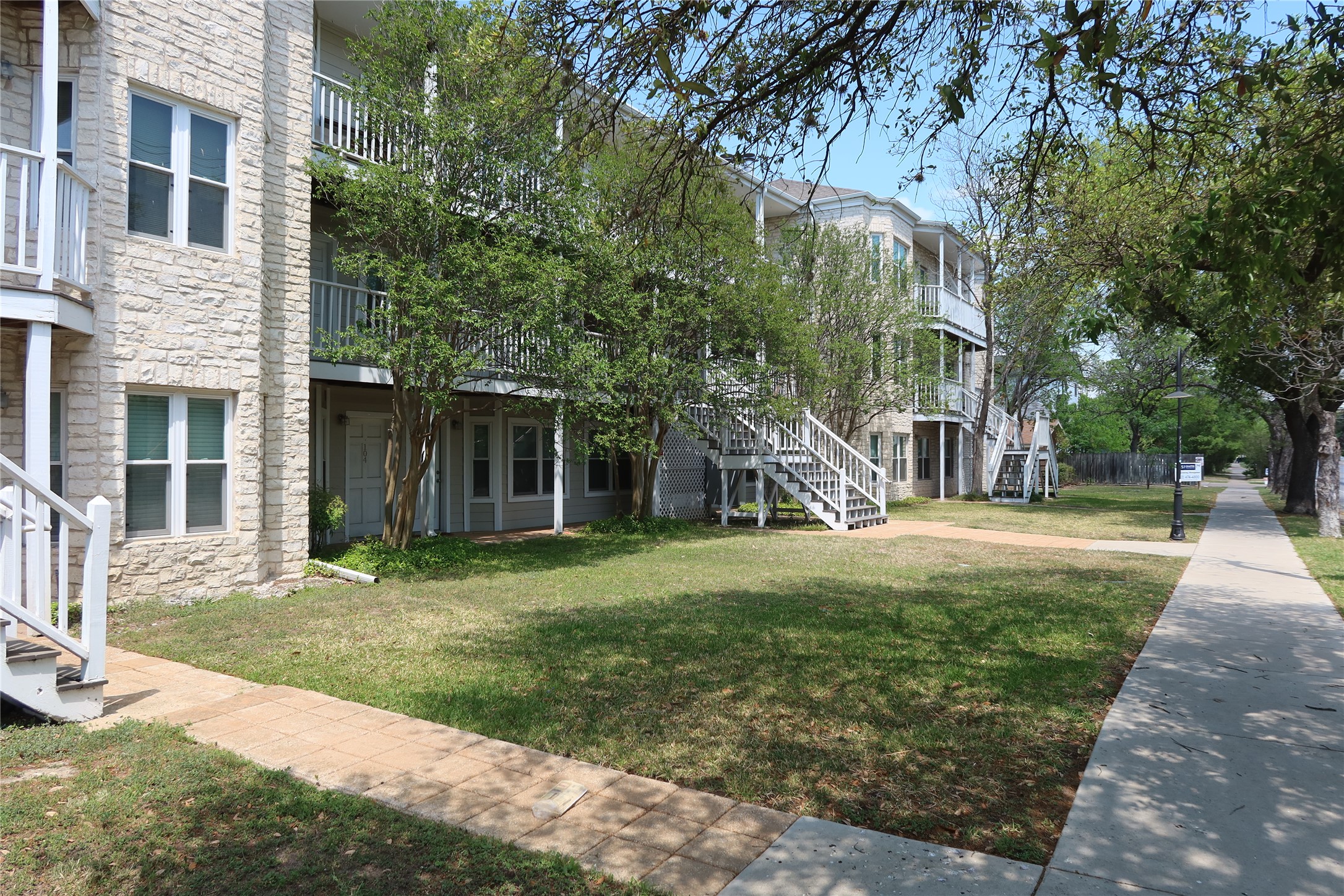 3400 Speedway, Unit 104 Austin, TX 78705 - Photo 2 of 23 View of property's community featuring a balcony
