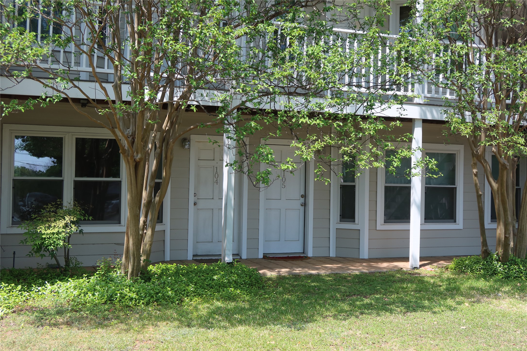 3400 Speedway, Unit 104 Austin, TX 78705 - Photo 3 of 23 Property entrance with a lawn and a patio area