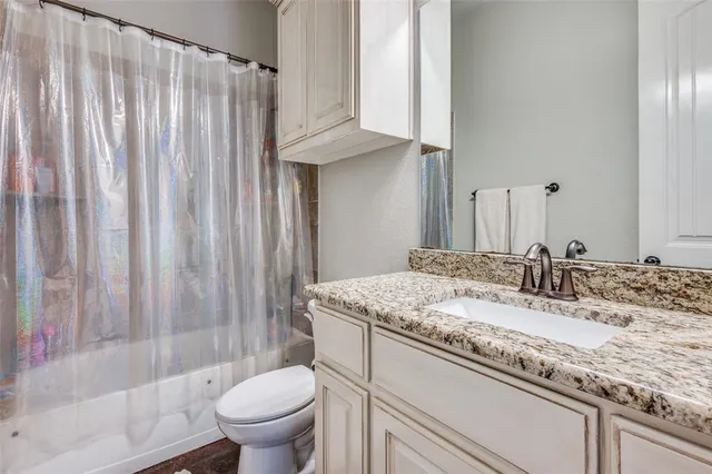 a view of an ocean beach and city