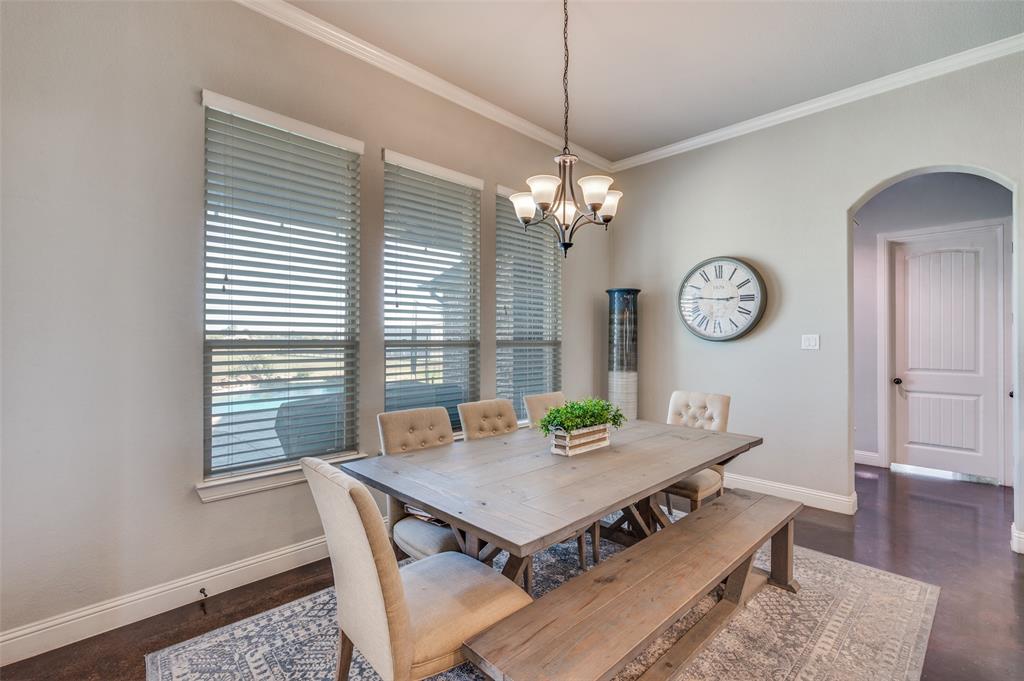 4140 Fm 2450 Krum, TX 76249 - Photo 24 of 28 a view of a dining room with furniture and wooden floor