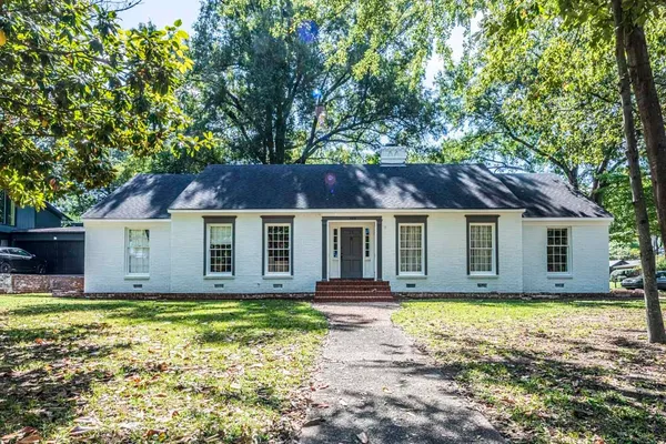 a view of a house with a patio
