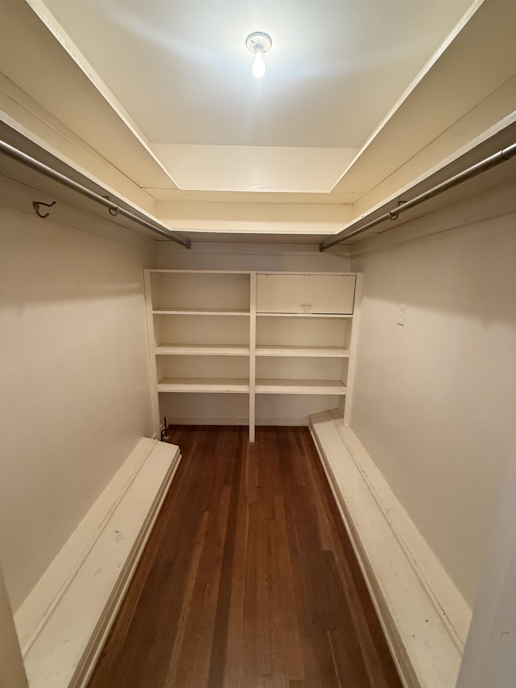 5575 Walnut Grove Road Memphis, TN 38120 - Photo 24 of 36 a view of a room with wooden floor