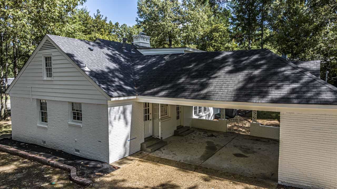 5575 Walnut Grove Road Memphis, TN 38120 - Photo 7 of 36 a view of a house with a roof deck