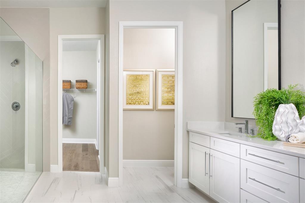 2012 Beach Terrace Celebration, FL 34747 - Photo 11 of 26 a bathroom with a tub and shower