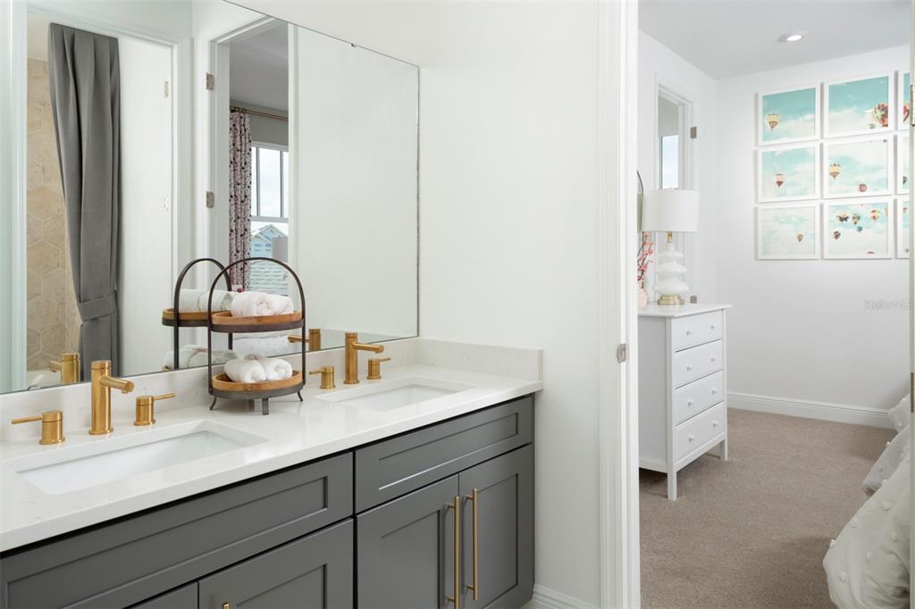 2012 Beach Terrace Celebration, FL 34747 - Photo 15 of 26 a bathroom with a sink and a mirror