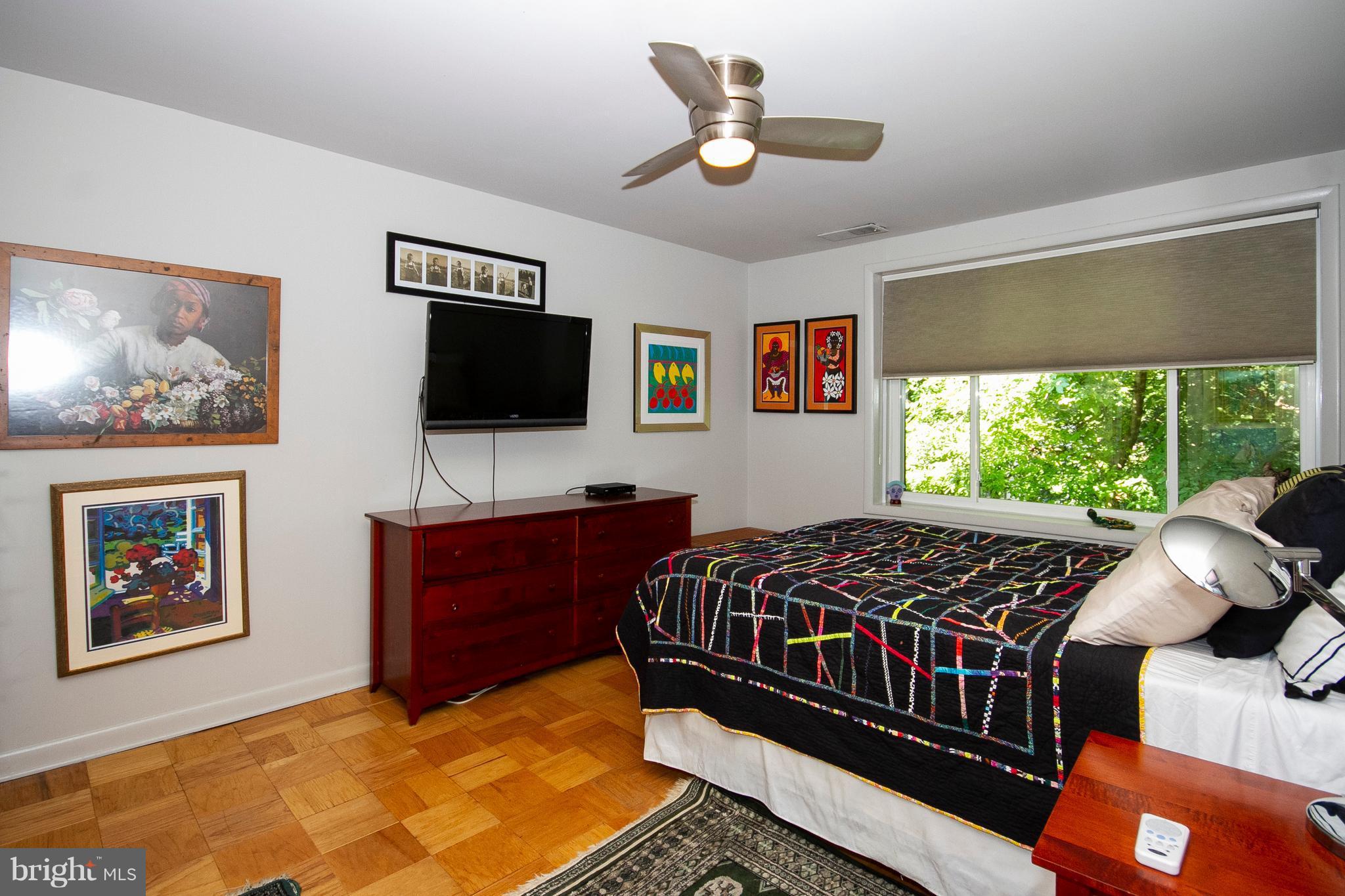 14 Cross Keys Road, Unit 14D Baltimore, MD 21210 - Photo 19 of 25 a bedroom with a bed and a window
