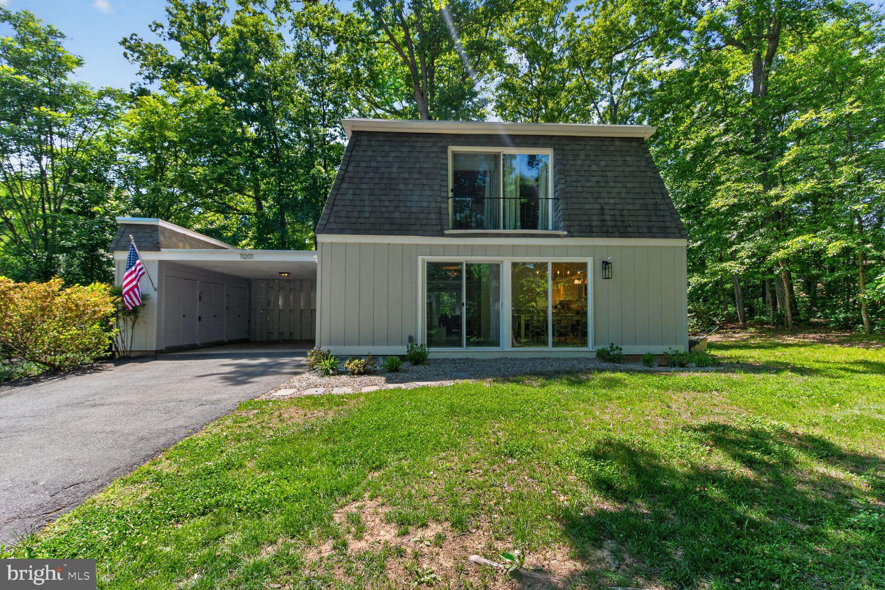 11201 Wedge Drive Reston, VA 20190 - Photo 3 of 31 front view of a house with a yard