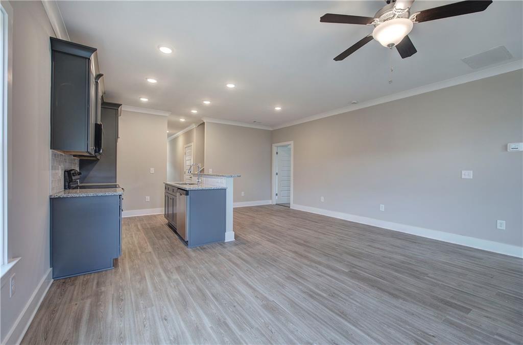 201 Daisy Court Cartersville, GA 30121 - Photo 14 of 36 a view of a kitchen with a sink and a window