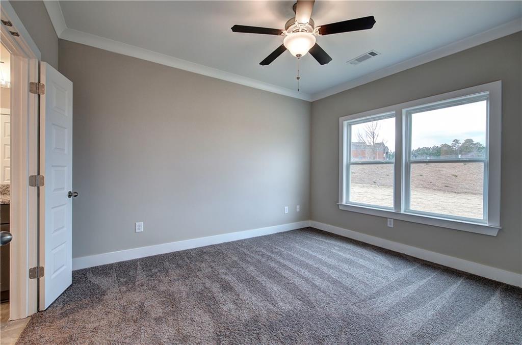 201 Daisy Court Cartersville, GA 30121 - Photo 18 of 36 a view of an empty room with a window