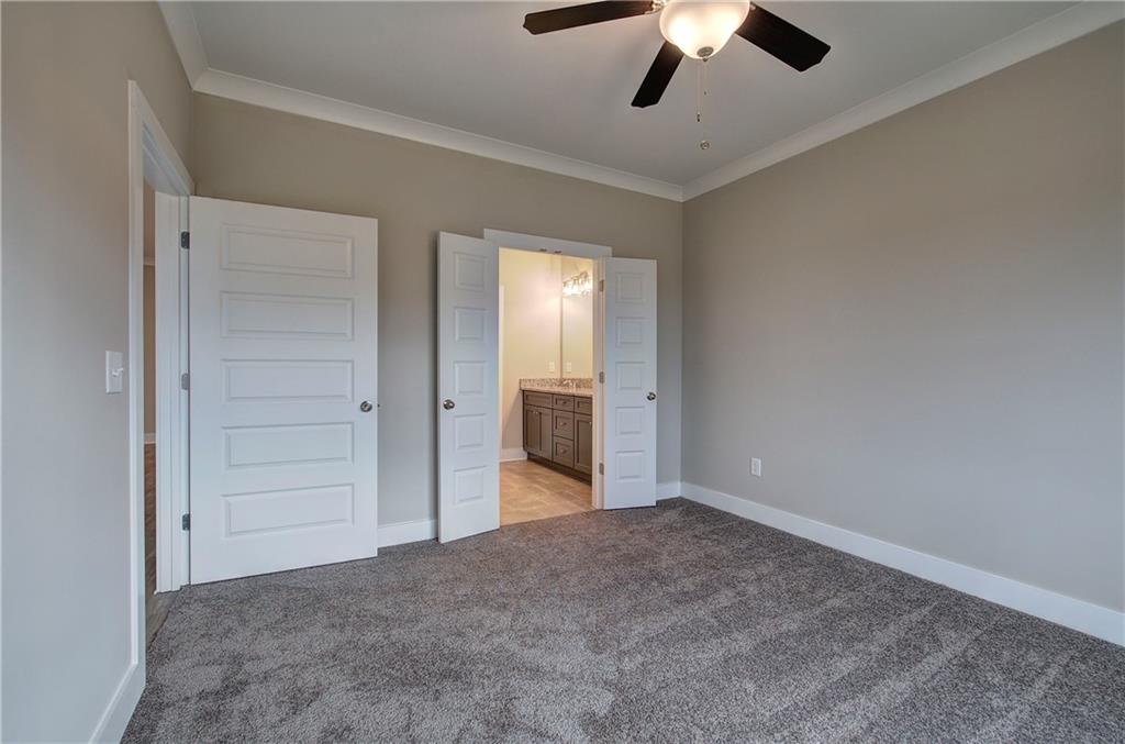 201 Daisy Court Cartersville, GA 30121 - Photo 19 of 36 wooden floor in an empty room and a chandelier fan