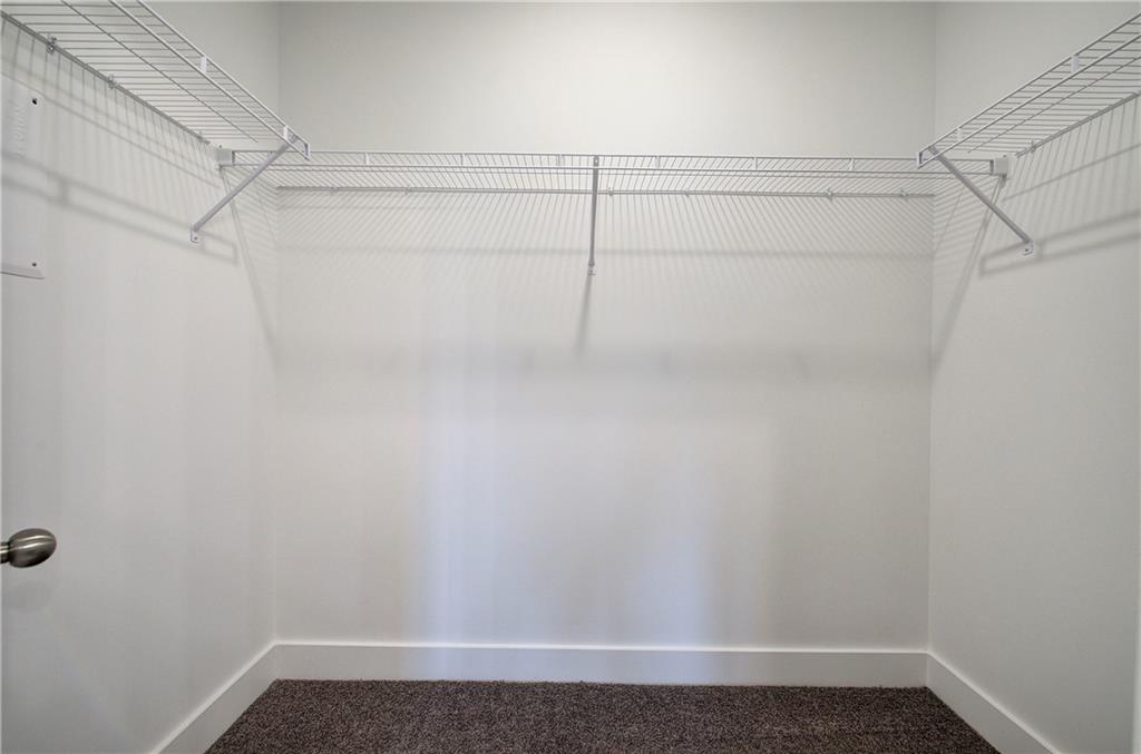 201 Daisy Court Cartersville, GA 30121 - Photo 23 of 36 a view of a room with racks on the wall