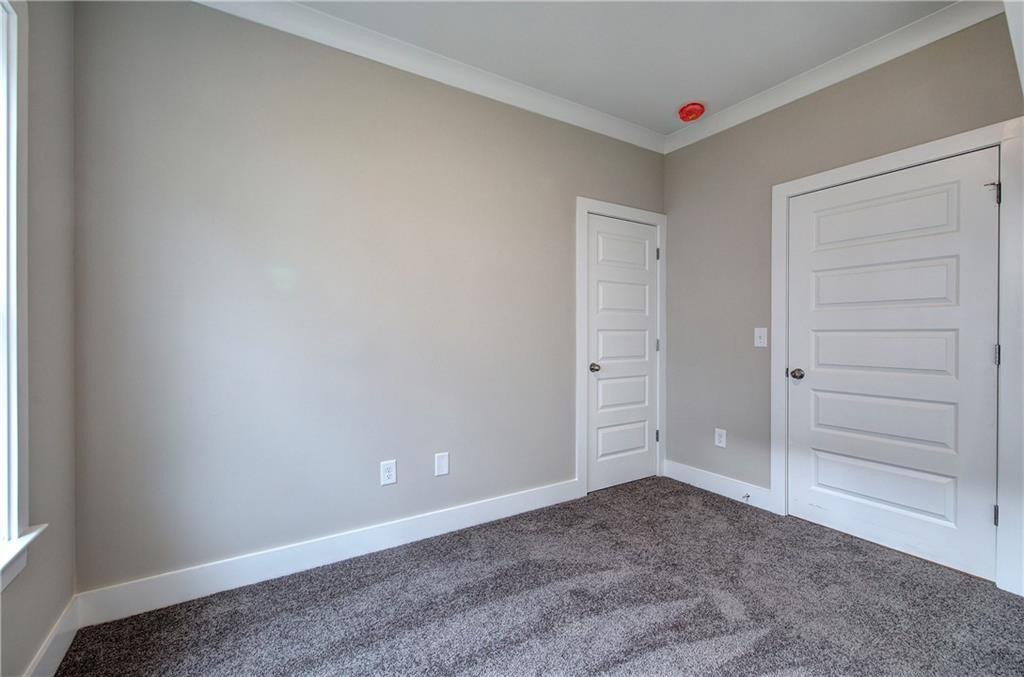 201 Daisy Court Cartersville, GA 30121 - Photo 26 of 36 an empty room with closet and a window