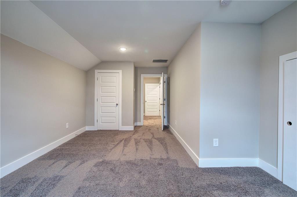 201 Daisy Court Cartersville, GA 30121 - Photo 29 of 36 a view of an empty room with a window