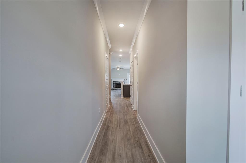 201 Daisy Court Cartersville, GA 30121 - Photo 3 of 36 a view of a hallway with wooden floor