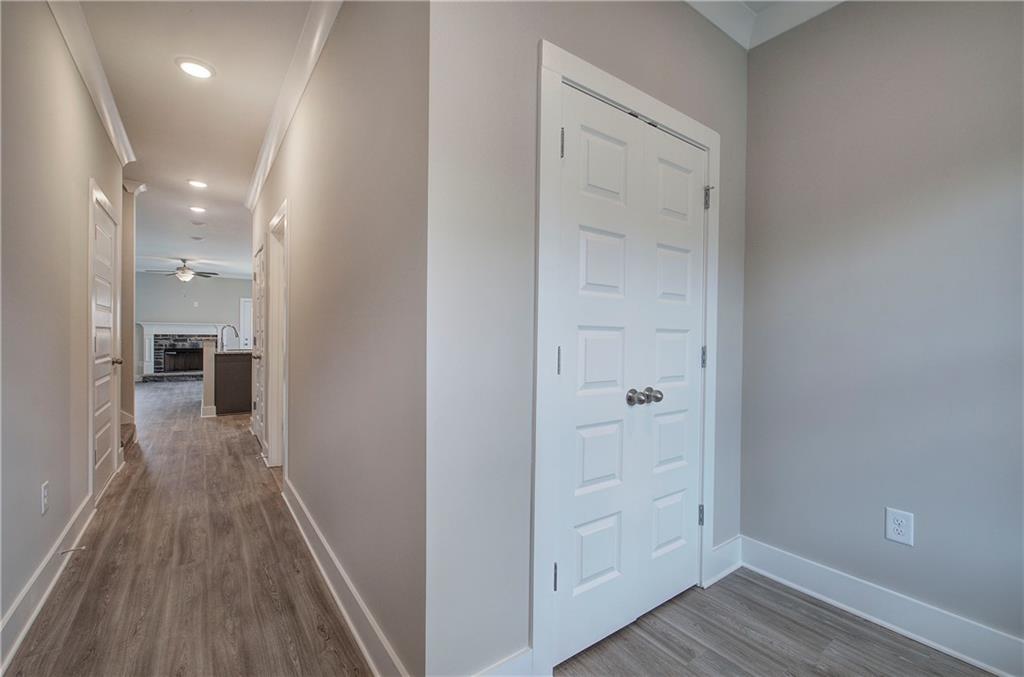 201 Daisy Court Cartersville, GA 30121 - Photo 4 of 36 a view of a hallway with wooden floor