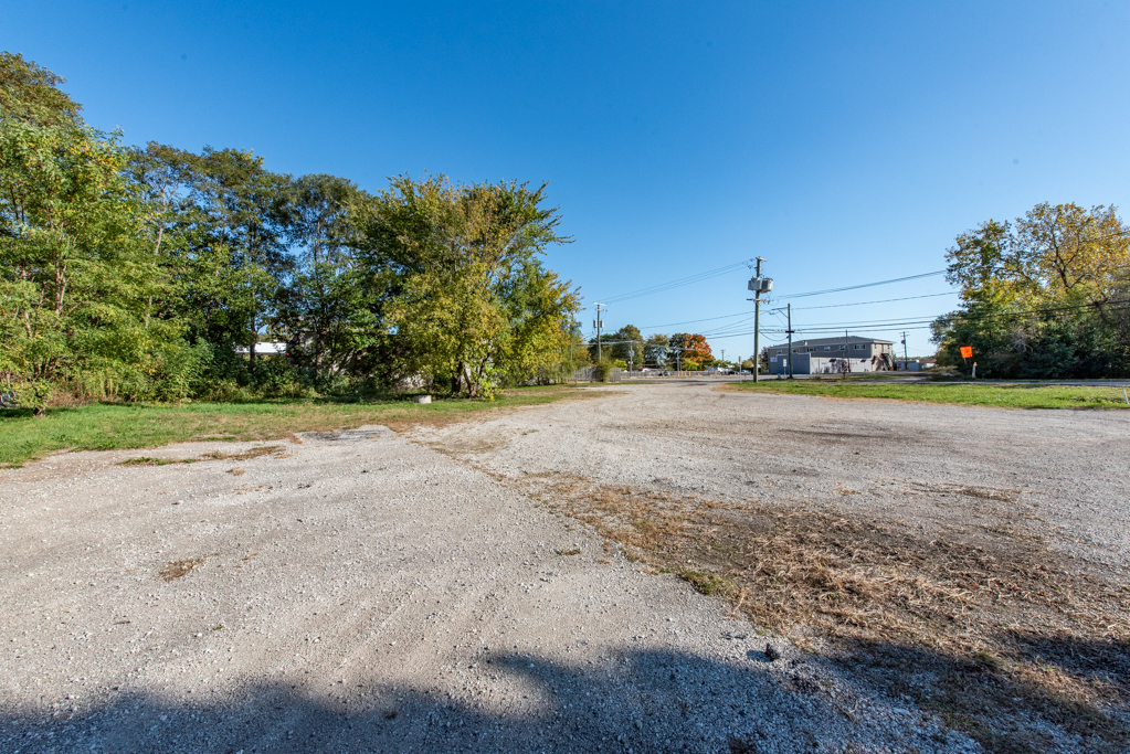 10038 West Beach Road Beach Park, IL 60099 - Photo 2 of 5 a view of a road with a yard