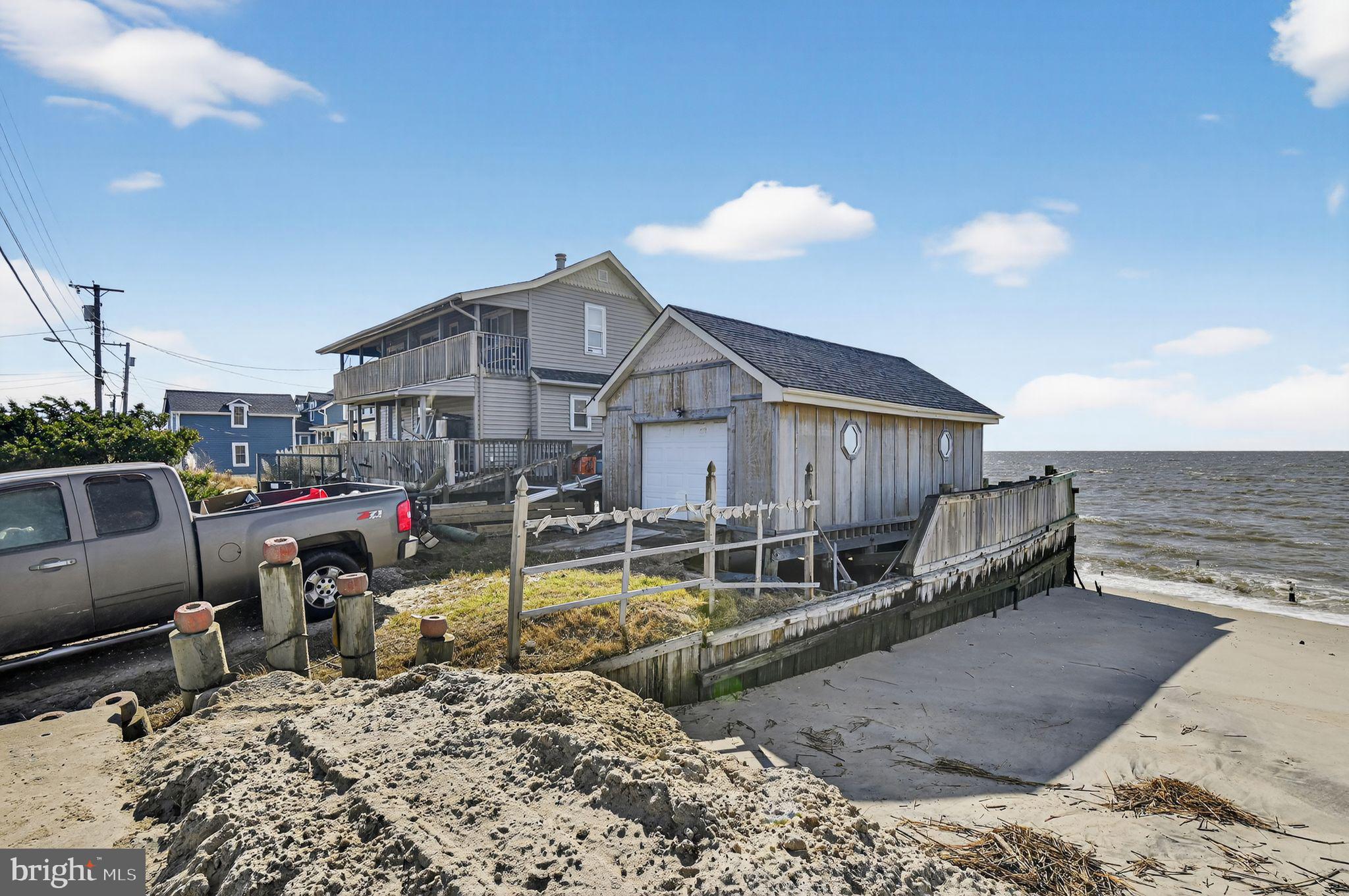 114 Delaware Avenue Fortescue, NJ 08321 - Photo 12 of 27 a view of a house with backyard and sitting area