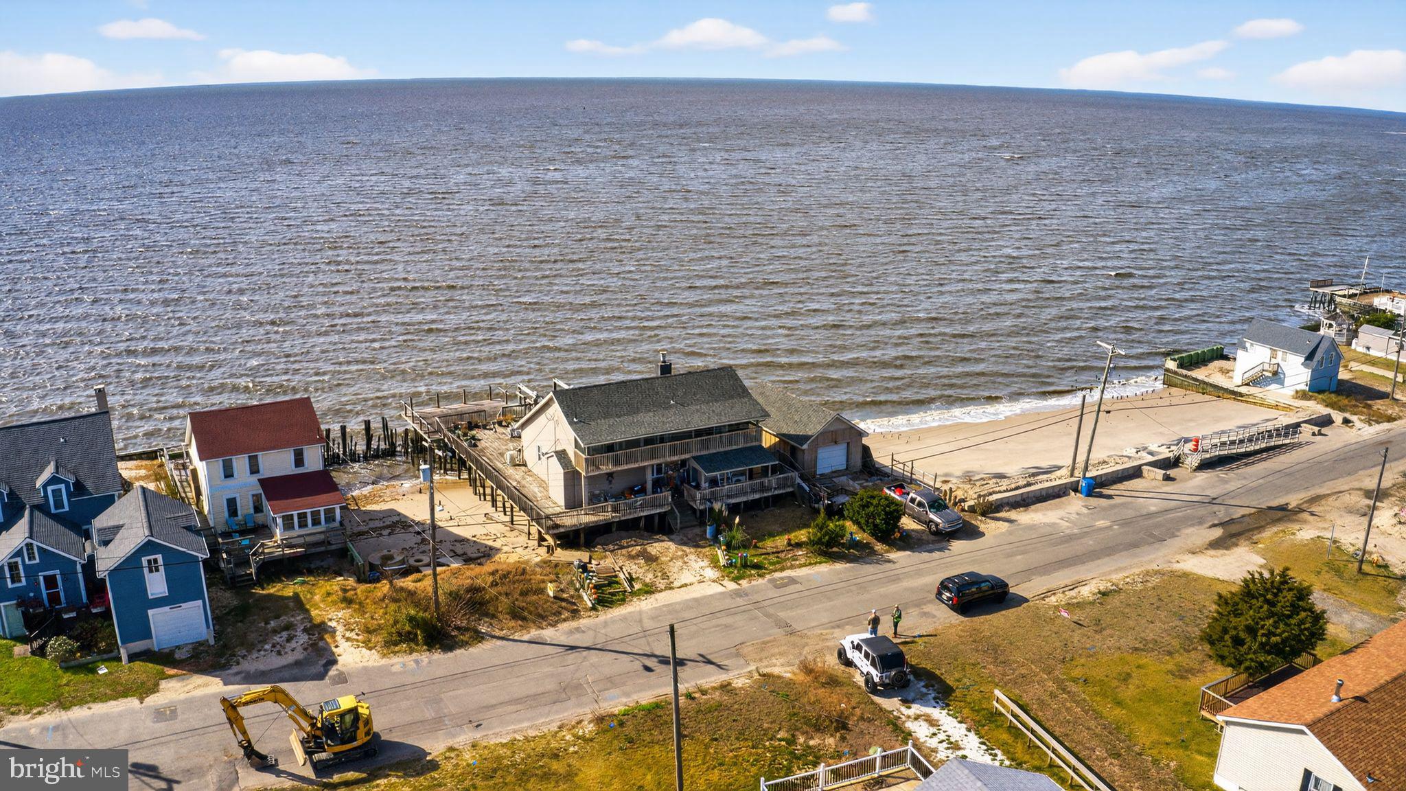 114 Delaware Avenue Fortescue, NJ 08321 - Photo 2 of 27 a view of a terrace with chairs