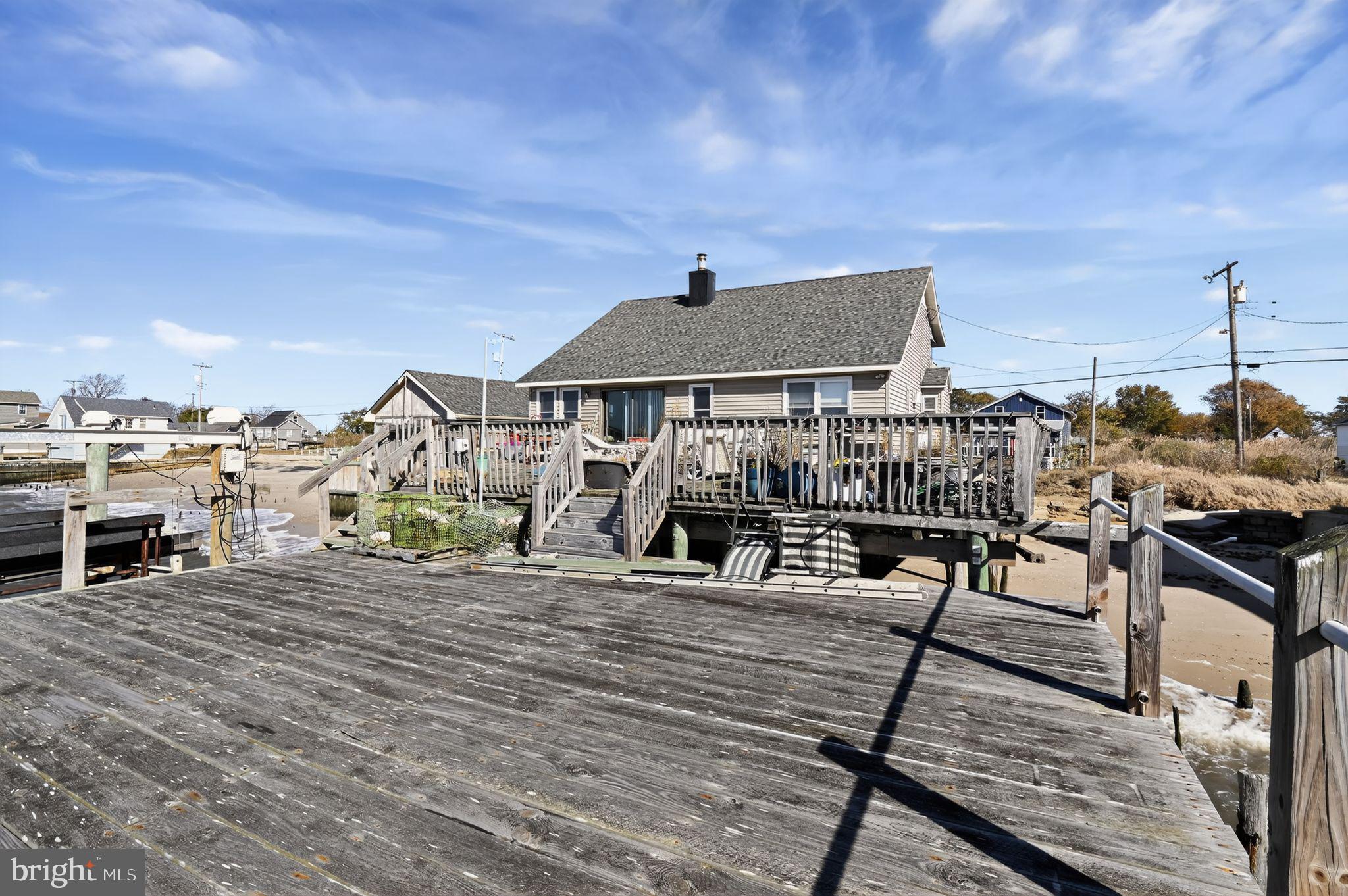 114 Delaware Avenue Fortescue, NJ 08321 - Photo 10 of 27 a front view of a house with sitting area