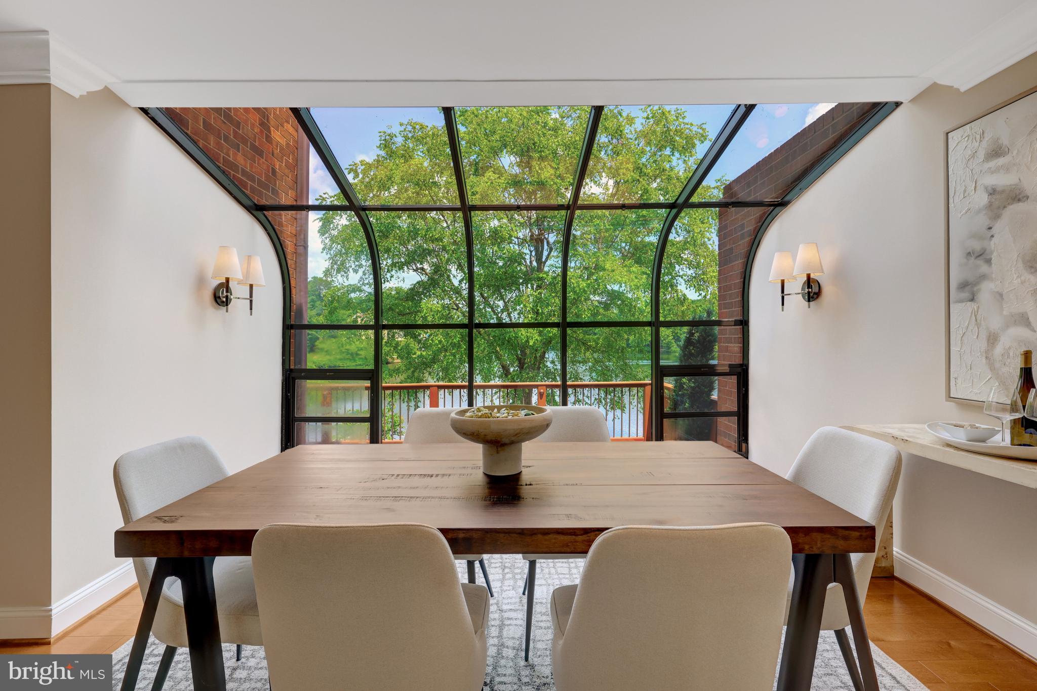 11064 Thrush Ridge Road Reston, VA 20191 - Photo 17 of 85 a view of a dining room with furniture window and outside view
