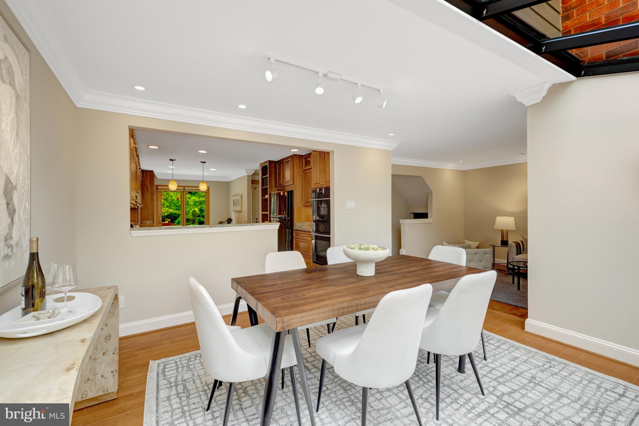 11064 Thrush Ridge Road Reston, VA 20191 - Photo 21 of 85 The dining room opens to the living room.
