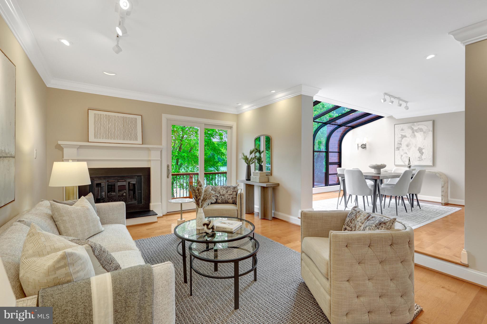 11064 Thrush Ridge Road Reston, VA 20191 - Photo 24 of 85 a living room with furniture and a fireplace