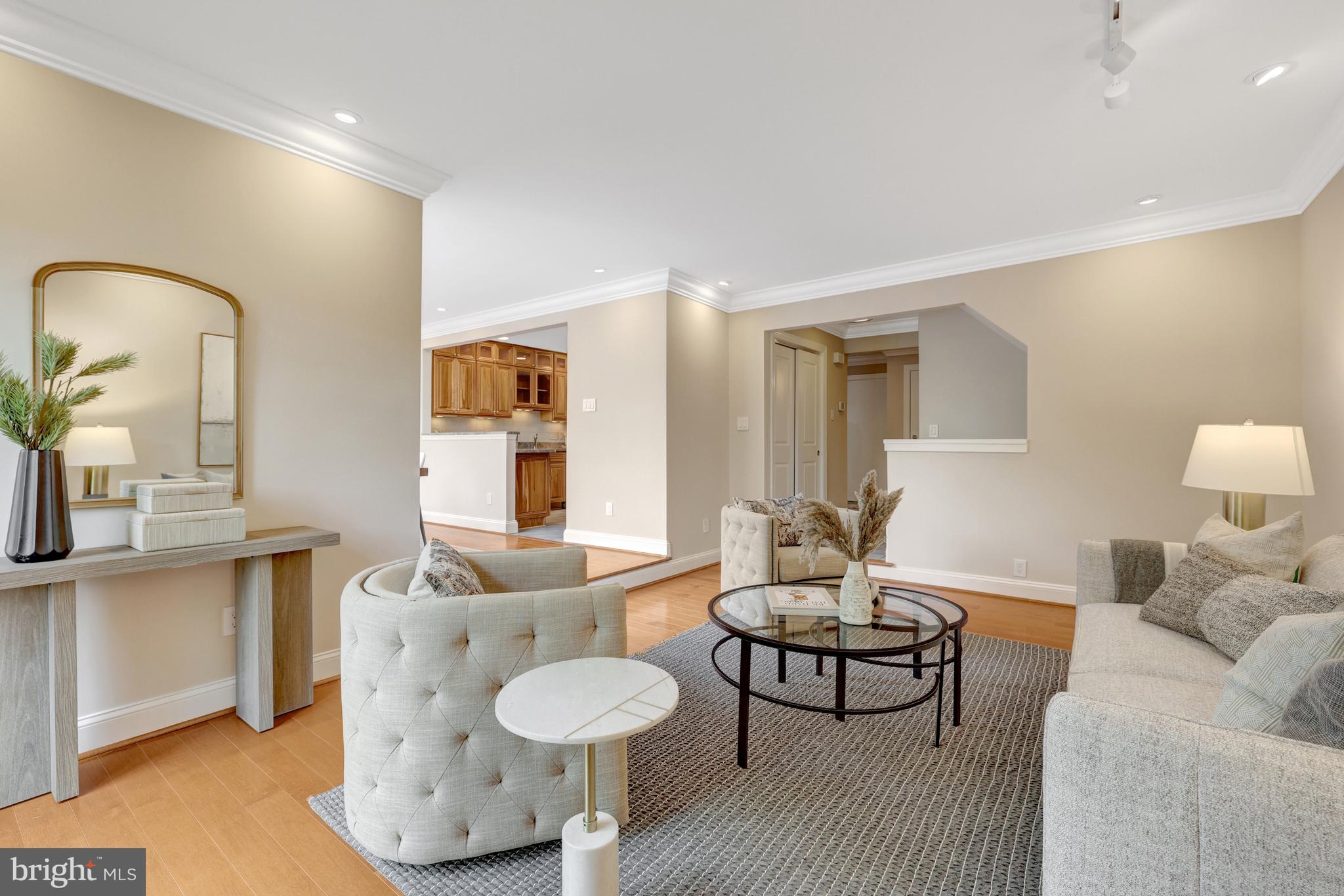 11064 Thrush Ridge Road Reston, VA 20191 - Photo 26 of 85 a living room with furniture and a wooden floor