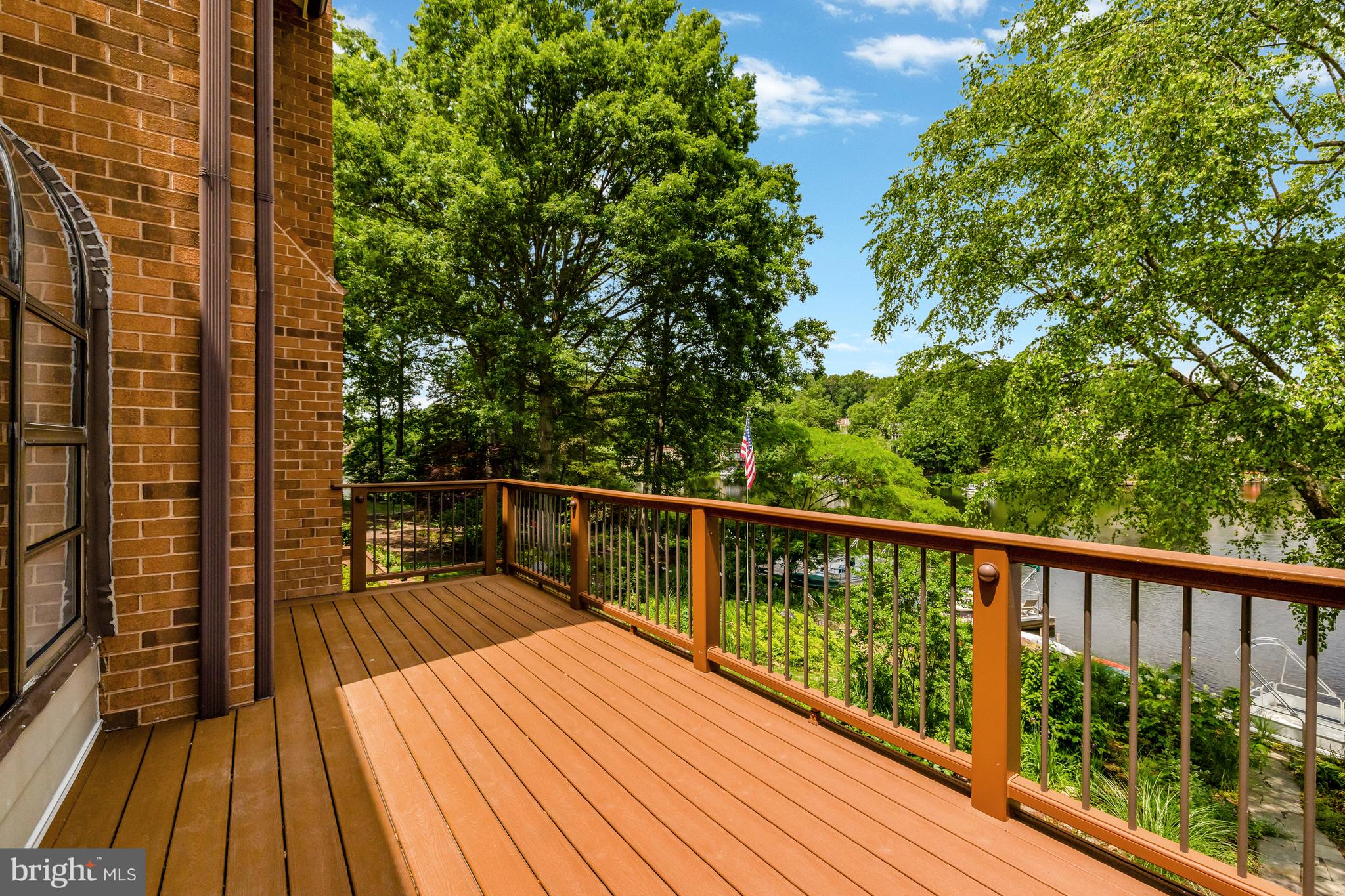 11064 Thrush Ridge Road Reston, VA 20191 - Photo 27 of 85 a view of balcony with wooden floor and fence