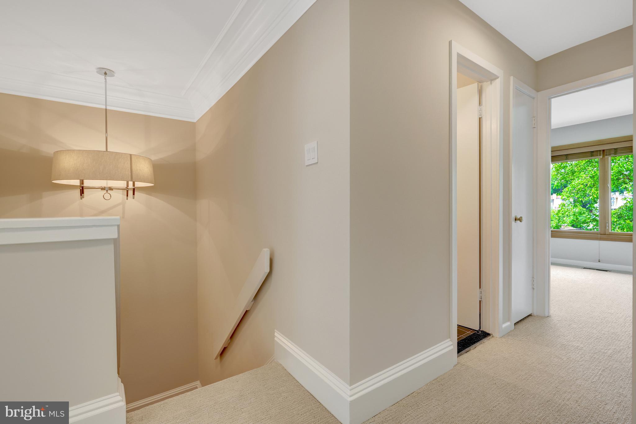 11064 Thrush Ridge Road Reston, VA 20191 - Photo 33 of 85 a view of a hallway with a white walls
