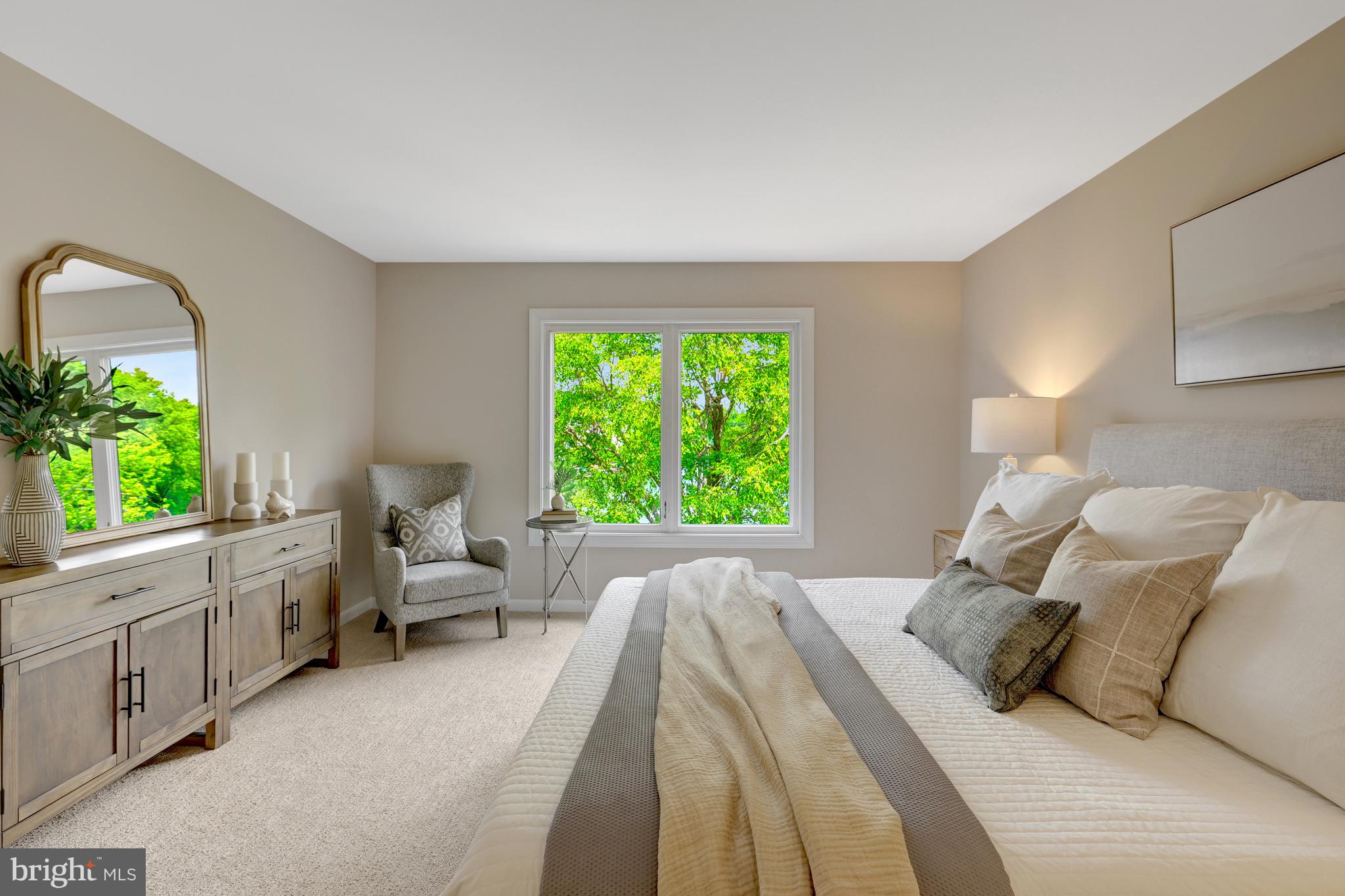 11064 Thrush Ridge Road Reston, VA 20191 - Photo 36 of 85 a bed room with a bed and a large window