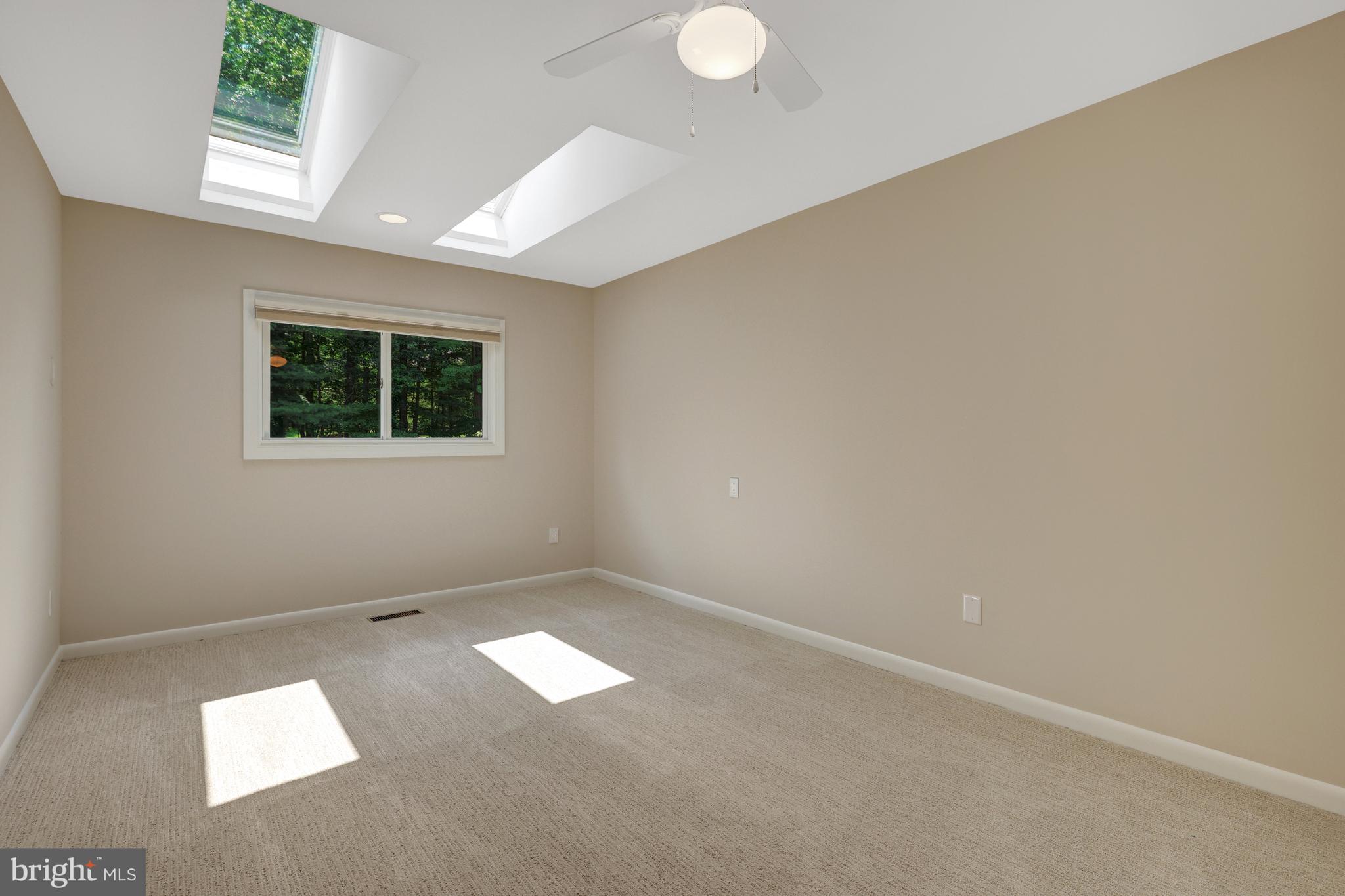 11064 Thrush Ridge Road Reston, VA 20191 - Photo 46 of 85 an empty room with a empty space and windows